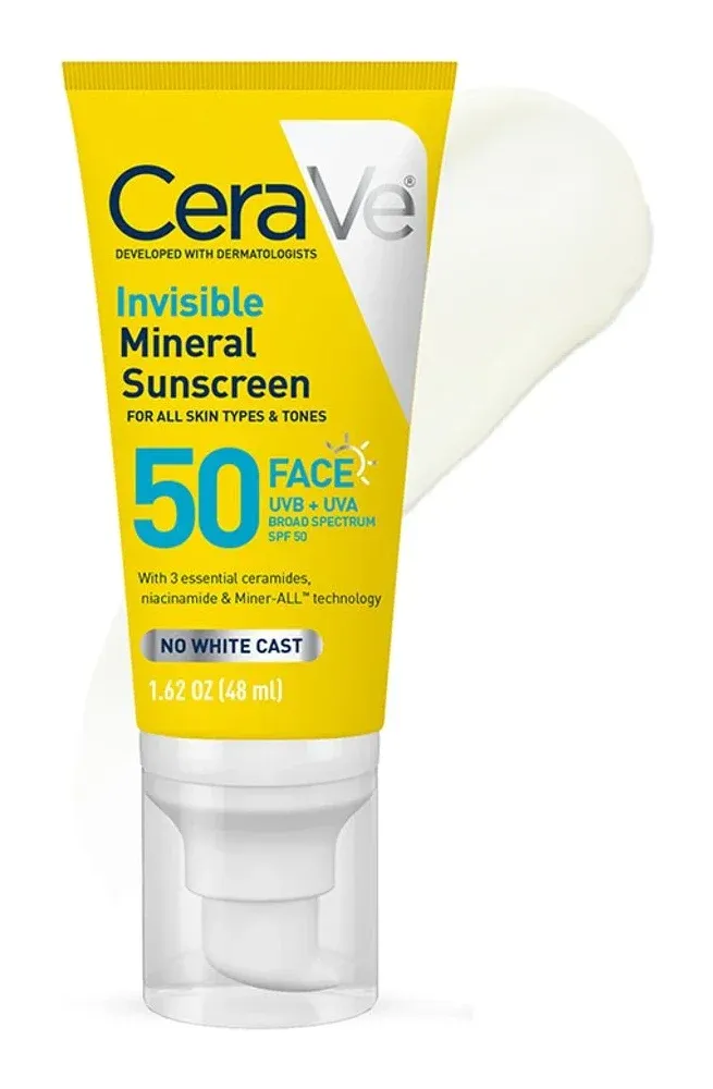 Yellow tube with a white pump cap beside a swatch of white lotion