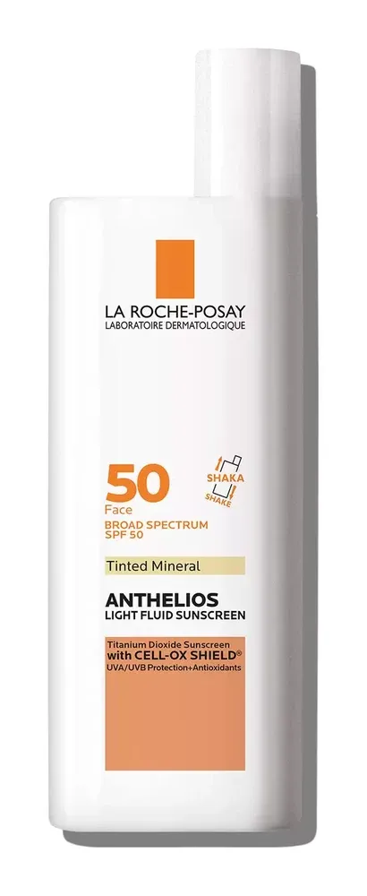 White and tan bottle with an orange logo